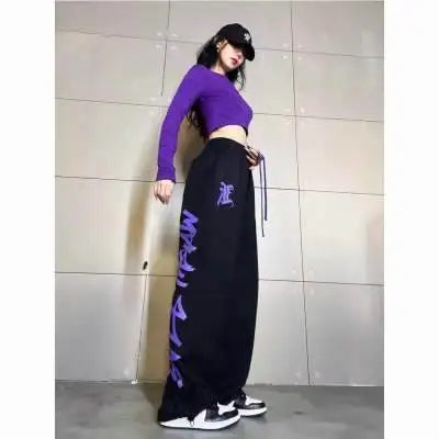 Dresy z napisem