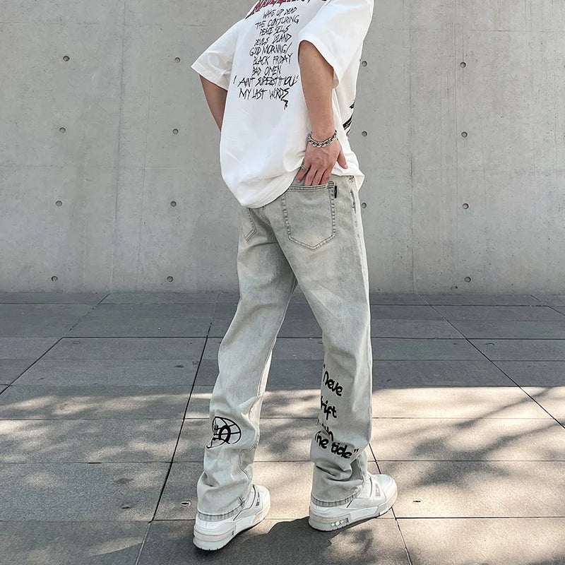 Jeansy z napisami vintage