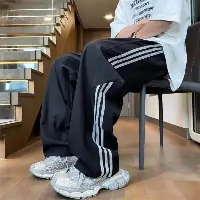 Dresy z napisem